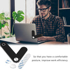 Black phone mount on a laptop in a home office