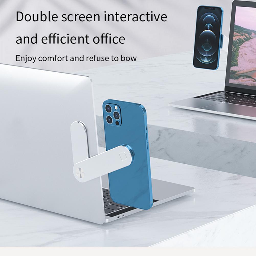 Phone attached to the side of a laptop for a dual-screen setup
